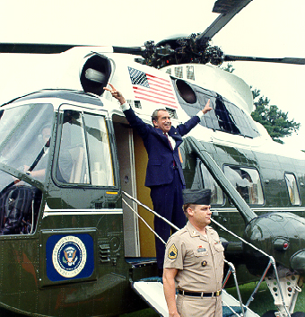 Richard Nixon boarding Army One upon his departure from the White House after resigning the office of President of the United States following the Watergate Scandal in 1974, via Wikimedia Commons