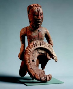 A wooden servant, c. A.D. 700, wood with traces of gesso: h. 33.8 cm, w. 18.2 cm, d. 14.0 cm (13 5/16 x 7 3/16 x 5 1/2 in.), Guatemala or Mexico.   © Princeton University Art Museum / Art Resource, NY