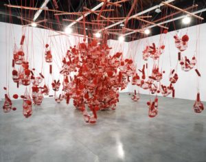 Tunga, True Rouge, 1998; 9 wooden crosses, nets, blown glass, sea sponges, and mixed materials; Installation view Tunga: True Rough at Luhring Augustine, New York, September 11-October 23, 1998 © Tunga; Courtesy of the artist and Luhring Augustine, New York